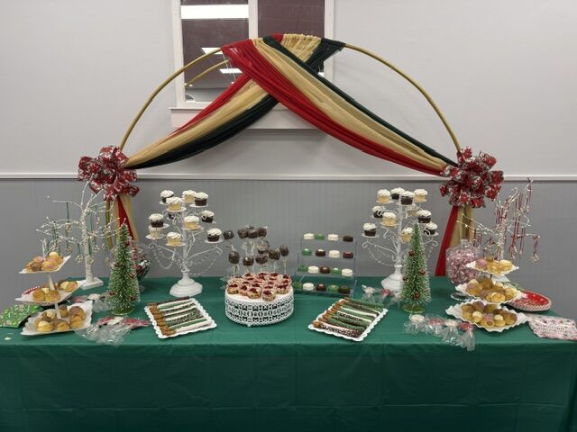 Fully styled event setup with balloons and treat table